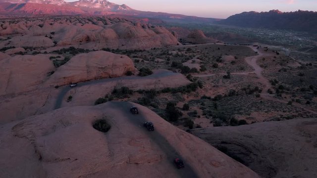Driving Hell's Revenge Trail at Sand Flats Recreation Area Near Moab, Utah U.S.A. Four Wheelers Aerial Drone Offroading 4x4 Jeepers