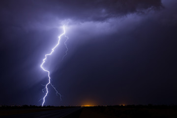 Thunderstorm lightning bolt strike