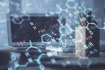 Desktop computer background and formula hologram writing. Double exposure. Education concept.