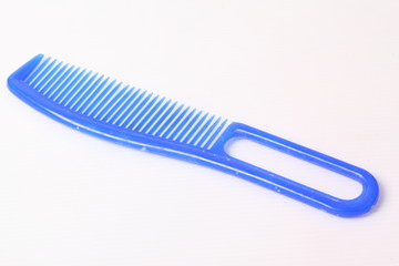 Blue comb isolated on white background