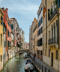 Venice, Italy May 18, 2015: Bridge connecting opposite sides of canals in Venice Italy