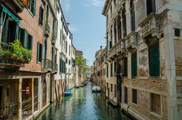 Fototapeta na wymiar Beautiful balconies outside of houses in Venice Italy in Europe