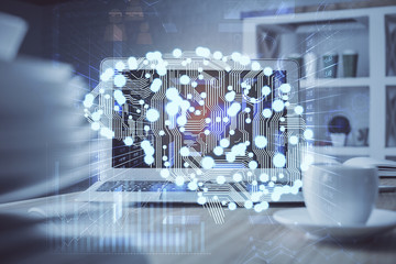 Double exposure of table with computer and brain hologram. Data innovation concept.