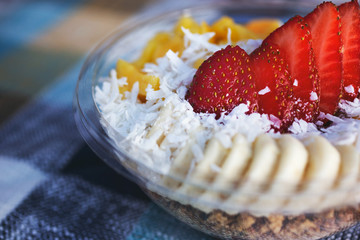 A view of an acai bowl in a restaurant or kitchen setting.
