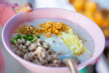Thai rice gruel with pork and egg