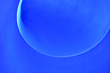 Exit view of a blue park slide