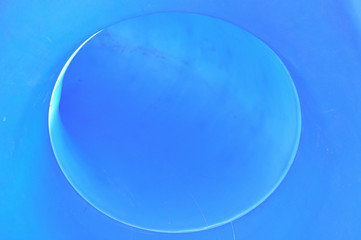 Exit view of a blue park slide