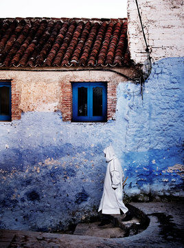 Man walking through the medina Chefchaouen, Atlas mountains, Morocco
