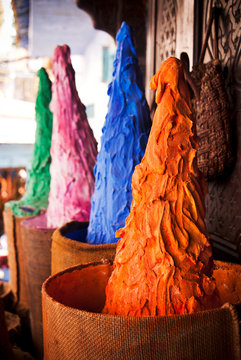 Colored pigments at a market in Chefchaouen, Atlas mountains, Morocco