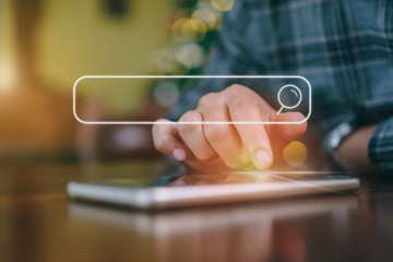 People hand using mobile phone or smartphone searching for information in internet online society web with search box icon.