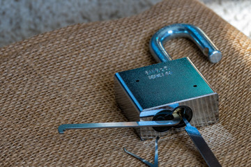 lock picking tools used to open a pad lock