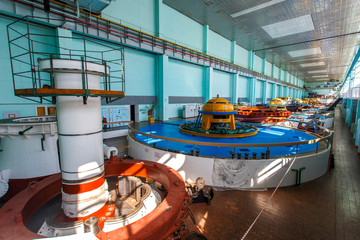 Industrial photography. Turbines in the main engine room of the Zeya hydroelectric station.
