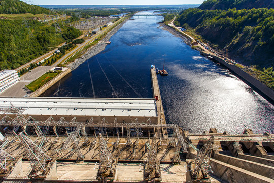 View from above. General view of the Zeya River from the upper point of the Zeya Dam. Concrete dam dam on top.
