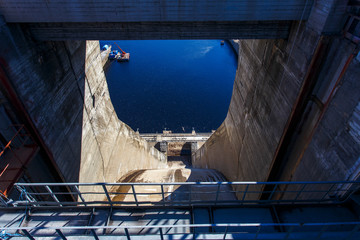 Industrial photography. Closed locks of Zeya hydroelectric power station against the background of...