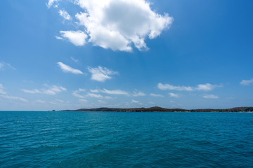 beautiful soft wave clear blue transparency sea ocean water and rocks at the bottom of the tropical paradise beach coast summer sea view at Samed Island, Rayong, Koh Samet, Thailand.
