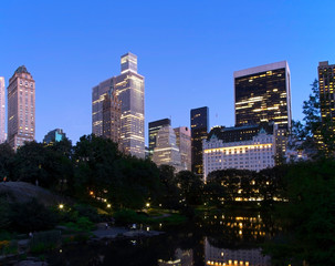 Central Park pond during evening in NYC - 328440350