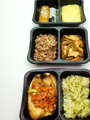 Proper nutrition, healthy food in plastic boxes, delivery concept.