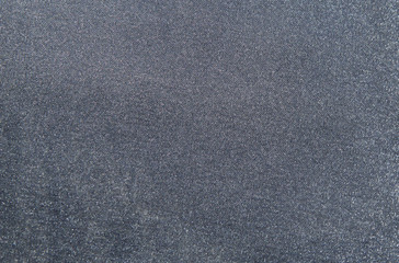 Gray shiny fabric material in zoom.