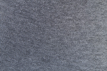 Fototapeta na wymiar Gray fabric with seams in the zoom.