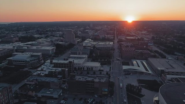 Aerial flying over Cleveland city at sunrise, Ohio, USA