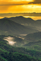 Natural background,high angle that overlooks blurred scenery from fog, rain that flows through,sees Buddha images,temples,mountains,is a viewpoint while traveling in Phetchabun,Khao Kho,Thailand