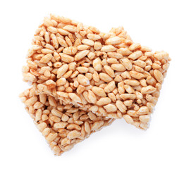 Delicious rice crispy treats isolated on white, top view