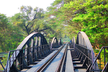 Fototapeta na wymiar Bridge on the River Kwai, made of thick steel Take over the big river. Can be used only once per train. Located in Kanchanaburi province of Thailand.
