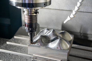 The CNC milling machine rough cutting  the injection mold parts by indexable  endmill tools. The...