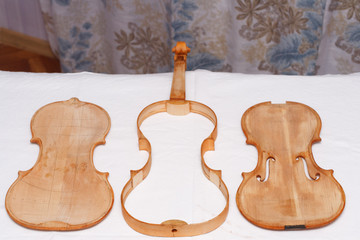 Broken antique violin for restoration with damage © Mikalai