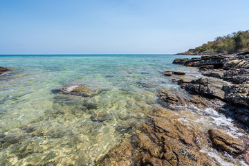 beautiful soft wave clear blue transparency sea ocean water and rocks at the bottom of the tropical paradise beach coast summer sea view at PP Island, Krabi, Phuket, Thailand.