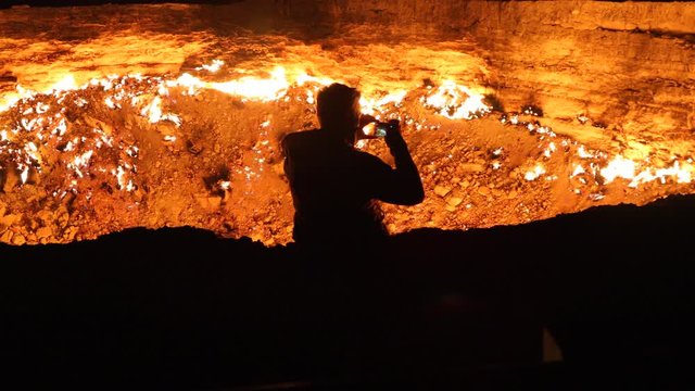  silhouette and fire darvaza gas crater
