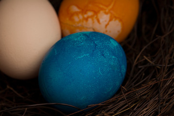 vintage Easter eggs in a wicker nest