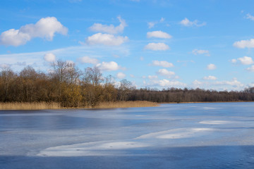 Beautiful landscape of a winter lake. Ice lake. The concept of appeasement and unity with nature