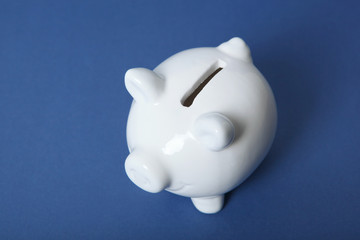 piggy piggy bank on a colored background. The concept of saving money.