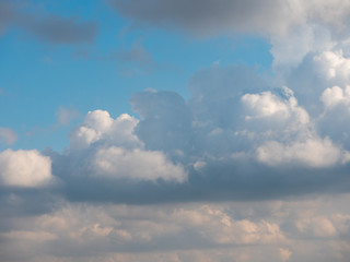 the movement of dark clouds in the blue sky