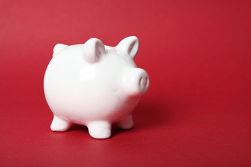 piggy piggy bank on a colored background. The concept of saving money.