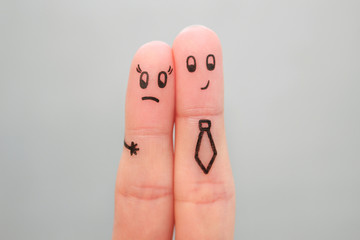 Fingers art of couple. Concept of man harassing woman at work.