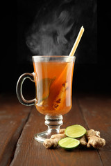 cup of tea with lemon on wooden table