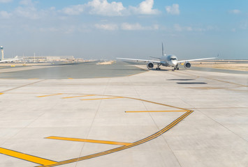 Commercial airliner on runway. Aircraft on the ground before taking off