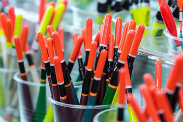 different fishing floats on the window of a fishing store. Shallow depth of field © OlegDoroshin