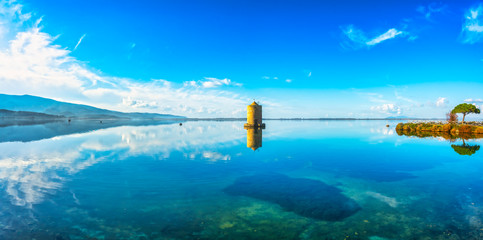 Old spanish windmill in Orbetello lagoon, Argentario, Italy.