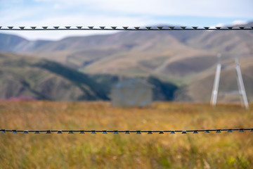 Barbed wire on border. Border security concept. Border control. Illegal border crossing concept.