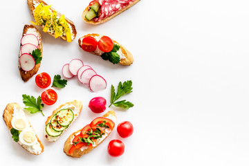 Sandwiches frame for menu design on white background top-down copy space