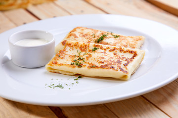 stuffed pancakes with sour cream