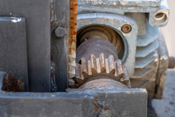 Details of rusty gear, rack and pinion.