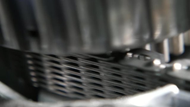 Big roller bearing rotating over wide chain line in a contemporary car gearbox