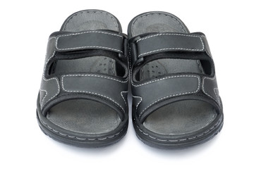 Slippers, pair of black shoes isolated on white background with clipping path.