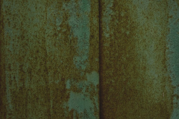 green metal sheet with rust