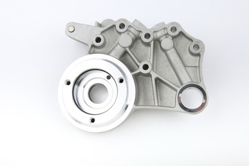 aluminium car engine part on white background top view 