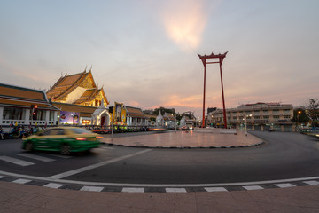 Fototapeta na wymiar BANGKOK, THAILAND - February 9, 2020 : The beauty of Wat Suthat and Sao Ching Cha (Giant Swing) during sunset.